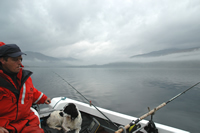 person out on the loch fishing in a boat